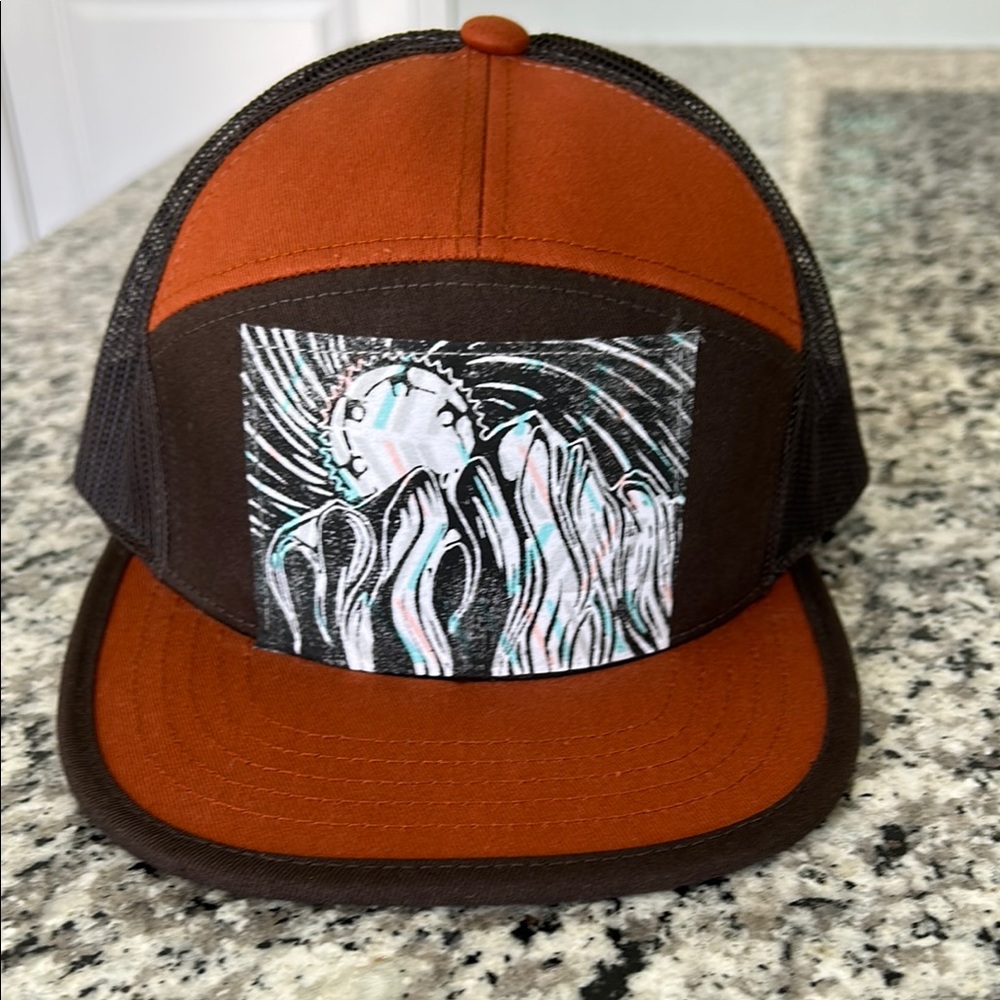 Recaps Brown and Black Trucker Hat. Brand new.